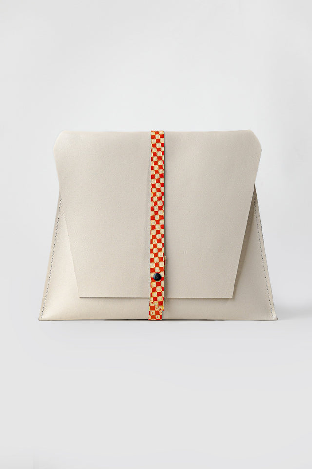 beige real leather clutch bag tacrai front photo